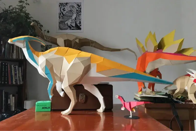 Art dinosaure orange profil