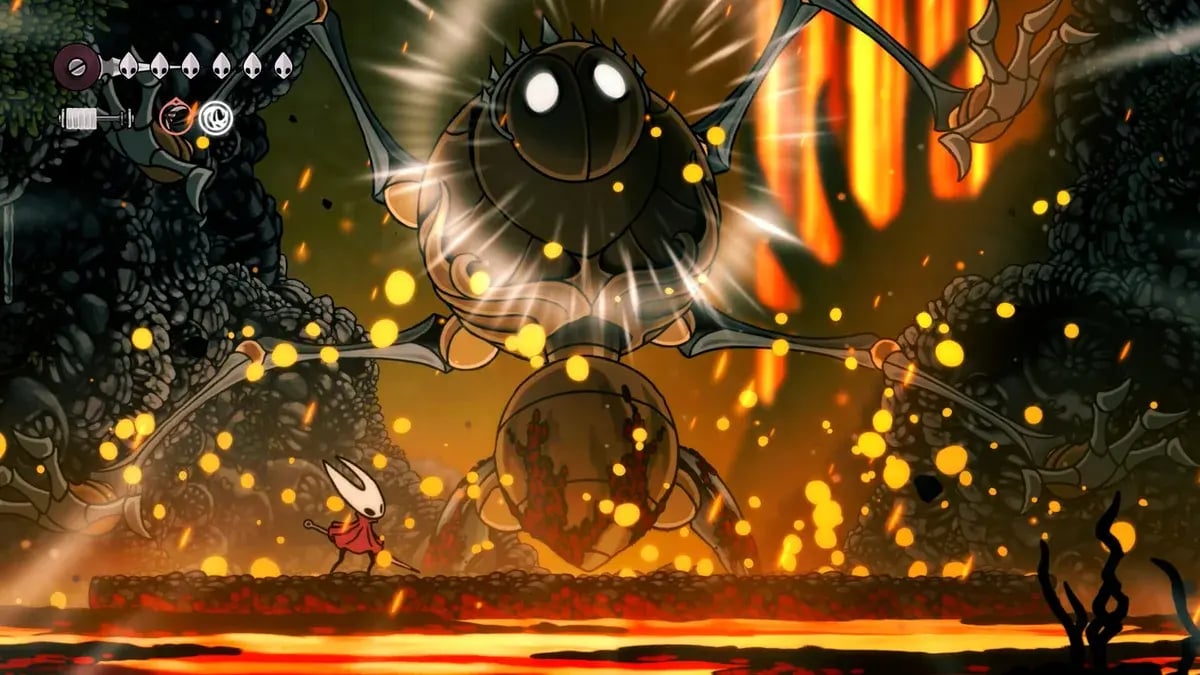 Hollow Knight: Silksong : combat contre un boss, avec en haut à gauche une interface réduite à quelques icônes