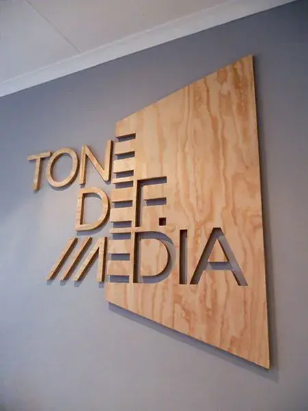 Tone def media office signage